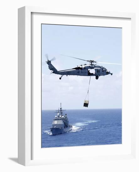 An Mh-60S Sea Hawk Helicopter Flying in Front of USS Gettysburg-null-Framed Photographic Print