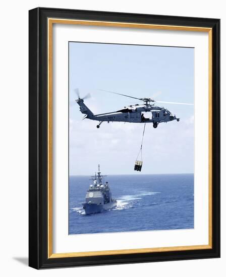 An Mh-60S Sea Hawk Helicopter Flying in Front of USS Gettysburg-null-Framed Photographic Print