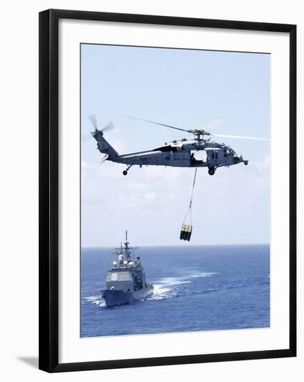 An Mh-60S Sea Hawk Helicopter Flying in Front of USS Gettysburg-null-Framed Photographic Print