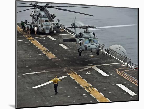 An MH-60S Sea Hawk Lands Aboard the Amphibious Assault Ship USS Makin Island-Stocktrek Images-Mounted Photographic Print