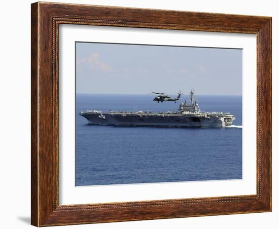 An MH-60S Seahawk Helicopter Flies over USS George H.W. Bush-Stocktrek Images-Framed Photographic Print