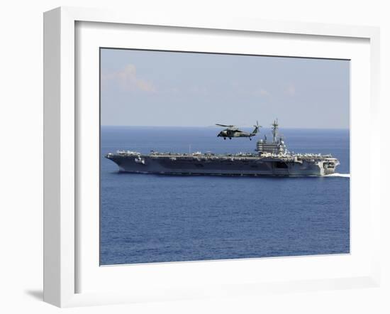 An MH-60S Seahawk Helicopter Flies over USS George H.W. Bush-Stocktrek Images-Framed Photographic Print