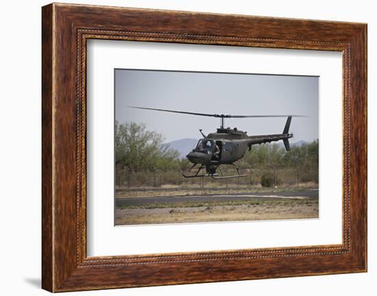 An Oh-58 Kiowa Helicopter of the U.S. Army Landing at Pinal Airpark, Arizona-Stocktrek Images-Framed Photographic Print