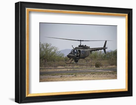 An Oh-58 Kiowa Helicopter of the U.S. Army Landing at Pinal Airpark, Arizona-Stocktrek Images-Framed Photographic Print