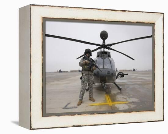 An Oh-58D Kiowa Warrior Pilot Stands Beside His Aircraft-null-Framed Premier Image Canvas