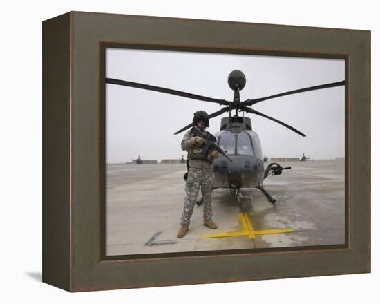 An Oh-58D Kiowa Warrior Pilot Stands Beside His Aircraft-null-Framed Premier Image Canvas