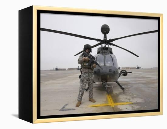 An Oh-58D Kiowa Warrior Pilot Stands Beside His Aircraft-null-Framed Premier Image Canvas