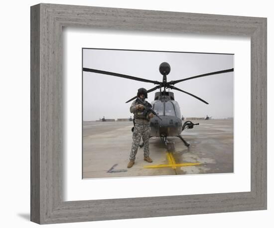 An Oh-58D Kiowa Warrior Pilot Stands Beside His Aircraft-null-Framed Photographic Print