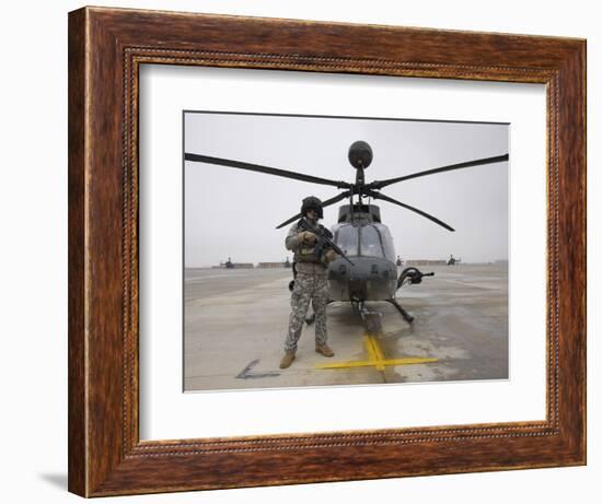 An Oh-58D Kiowa Warrior Pilot Stands Beside His Aircraft-null-Framed Photographic Print