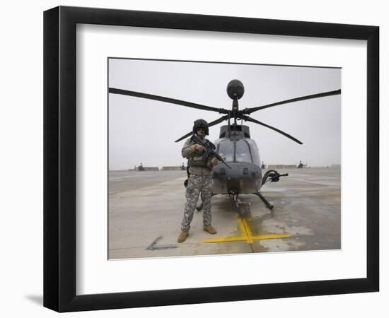 An Oh-58D Kiowa Warrior Pilot Stands Beside His Aircraft-null-Framed Photographic Print
