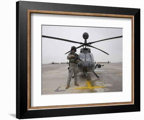 An Oh-58D Kiowa Warrior Pilot Stands Beside His Aircraft-null-Framed Photographic Print