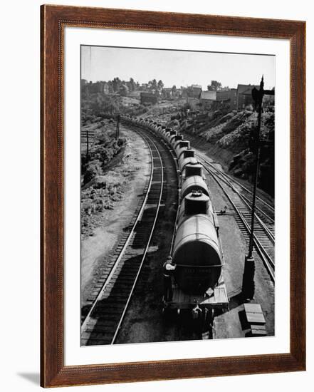 An Oil Tank Train Traveling to it's Destination-Bernard Hoffman-Framed Premium Photographic Print