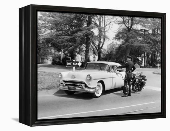 An Oldsmobile at the Corner of an American Street, 1954-null-Framed Premier Image Canvas
