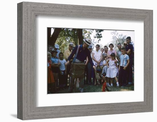 An Organ Grinder and His Monkey Perform at the Iowa State Fair, Des Moines, Iowa, 1955-John Dominis-Framed Photographic Print