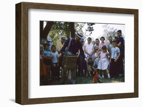 An Organ Grinder and His Monkey Perform at the Iowa State Fair, Des Moines, Iowa, 1955-John Dominis-Framed Photographic Print