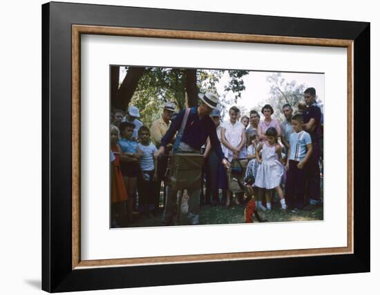 An Organ Grinder and His Monkey Perform at the Iowa State Fair, Des Moines, Iowa, 1955-John Dominis-Framed Photographic Print