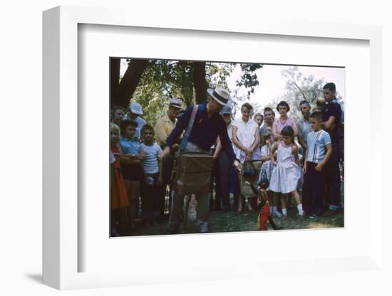 An Organ Grinder and His Monkey Perform at the Iowa State Fair, Des Moines, Iowa, 1955-John Dominis-Framed Photographic Print