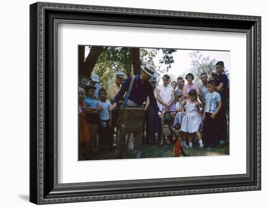 An Organ Grinder and His Monkey Perform at the Iowa State Fair, Des Moines, Iowa, 1955-John Dominis-Framed Photographic Print