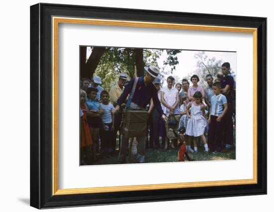 An Organ Grinder and His Monkey Perform at the Iowa State Fair, Des Moines, Iowa, 1955-John Dominis-Framed Photographic Print