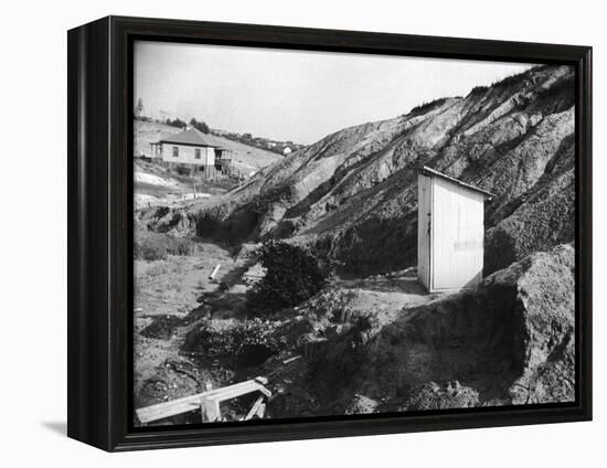 An Outhouse in an Area That Is Plagued with Soil Erosion-Alfred Eisenstaedt-Framed Premier Image Canvas