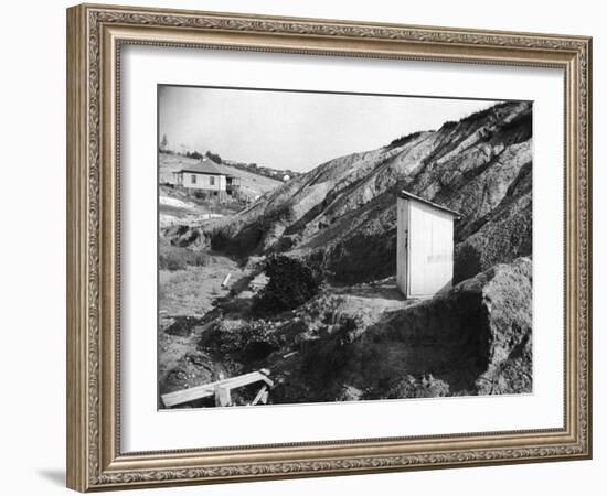 An Outhouse in an Area That Is Plagued with Soil Erosion-Alfred Eisenstaedt-Framed Photographic Print