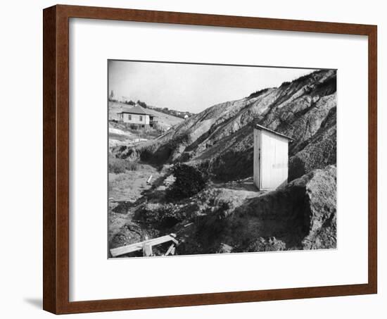 An Outhouse in an Area That Is Plagued with Soil Erosion-Alfred Eisenstaedt-Framed Photographic Print