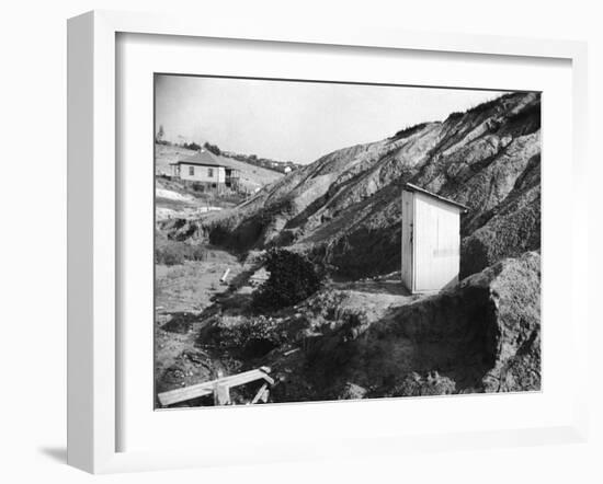 An Outhouse in an Area That Is Plagued with Soil Erosion-Alfred Eisenstaedt-Framed Photographic Print