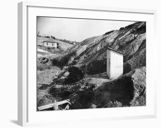 An Outhouse in an Area That Is Plagued with Soil Erosion-Alfred Eisenstaedt-Framed Photographic Print