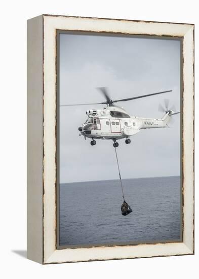 An SA-330 Puma Transport Helicopter Moves Cargo During a Vertical Replenishment-null-Framed Premier Image Canvas