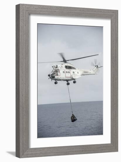 An SA-330 Puma Transport Helicopter Moves Cargo During a Vertical Replenishment-null-Framed Photographic Print