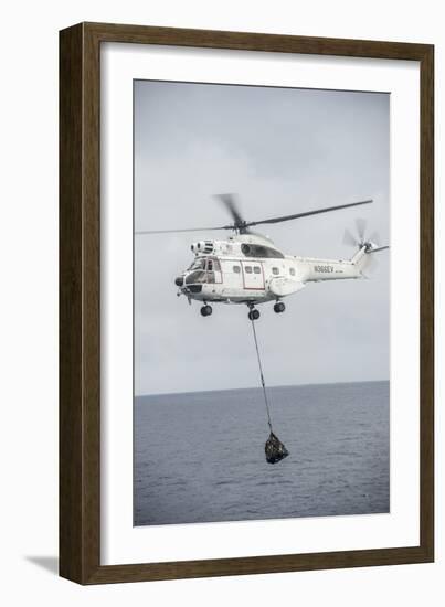 An SA-330 Puma Transport Helicopter Moves Cargo During a Vertical Replenishment-null-Framed Photographic Print