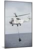 An SA-330 Puma Transport Helicopter Moves Cargo During a Vertical Replenishment-null-Mounted Photographic Print