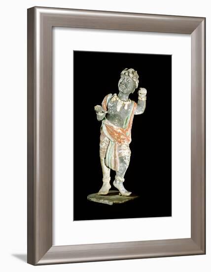 An unglazed and painted pottery model of a curly-headed and bejewelled youth-Werner Forman-Framed Giclee Print