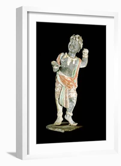 An unglazed and painted pottery model of a curly-headed and bejewelled youth-Werner Forman-Framed Giclee Print