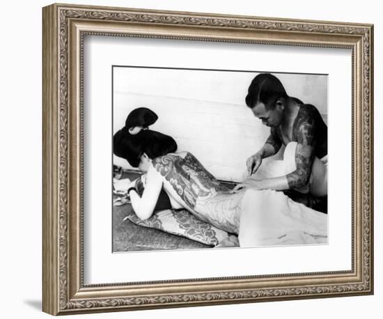 An Unidentified Japanese Tattoo Artist Works on a Woman's Backside--Framed Photographic Print