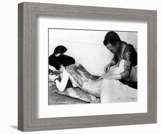 An Unidentified Japanese Tattoo Artist Works on a Woman's Backside-null-Framed Photographic Print