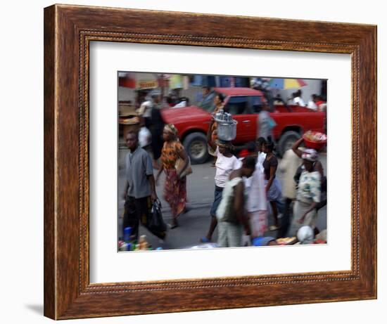 An Water Vendor Walks in the Streets of Port-Au-Prince, Haiti-null-Framed Photographic Print