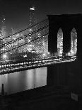 Glittering Night View of the Brooklyn Bridge Spanning the Glassy Waters of the East River-Andreas Feininger-Photographic Print