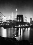Glittering Night View of the Brooklyn Bridge Spanning the Glassy Waters of the East River-Andreas Feininger-Photographic Print