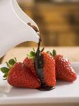 Pouring Chocolate Sauce over Fresh Strawberries-Andrew Pini-Photographic Print