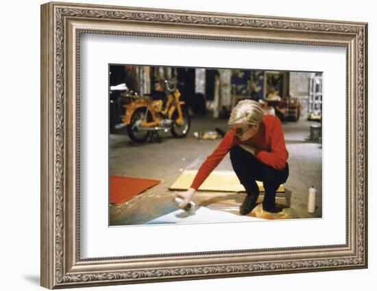 Andy with Spray Paint and Moped, The Factory, NYC, circa 1965-Nat Finkelstein-Framed Art Print