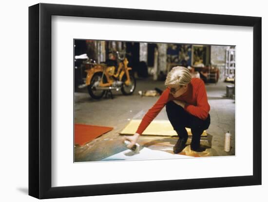 Andy with Spray Paint and Moped, The Factory, NYC, circa 1965-Nat Finkelstein-Framed Art Print