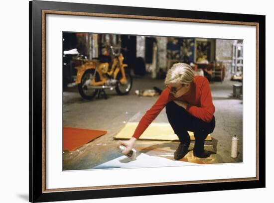 Andy with Spray Paint and Moped, The Factory, NYC, circa 1965-Andy Warhol/ Nat Finkelstein-Framed Art Print