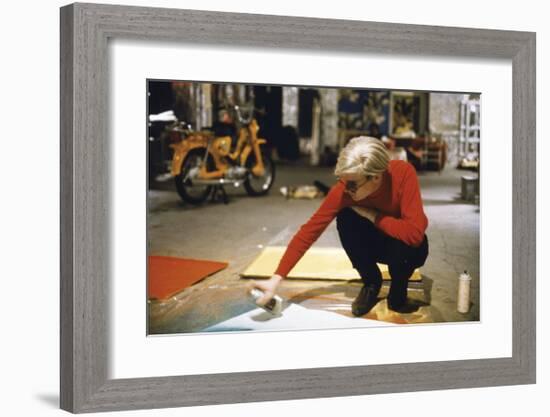 Andy with Spray Paint and Moped, The Factory, NYC, circa 1965-Andy Warhol/ Nat Finkelstein-Framed Giclee Print