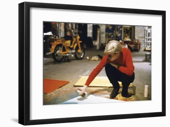 Andy with Spray Paint and Moped, The Factory, NYC, circa 1965-Andy Warhol/ Nat Finkelstein-Framed Giclee Print