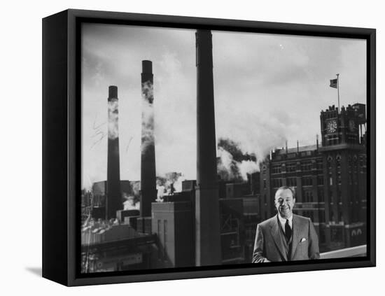 Anheuser Busch Heir Augusta. Busch Jr. Standing in Front of a Budweiser Brewery-Margaret Bourke-White-Framed Premier Image Canvas