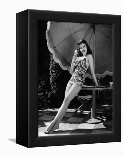 Ann Miller Eating Ice Cream, c.1941-null-Framed Stretched Canvas