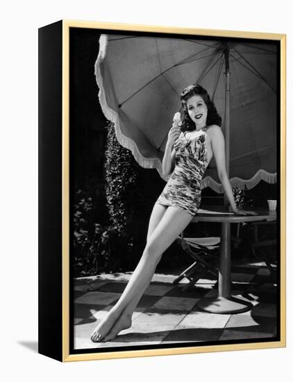 Ann Miller Eating Ice Cream, c.1941-null-Framed Stretched Canvas