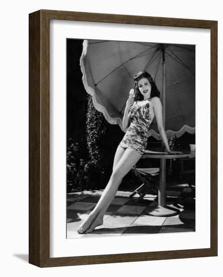 Ann Miller Eating Ice Cream, c.1941-null-Framed Photo