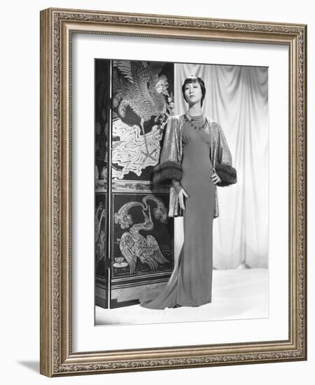 Anna May Wong in an Edith Head-Designed Crepe Dinner Gown with a Jacket of Emerald-null-Framed Photo